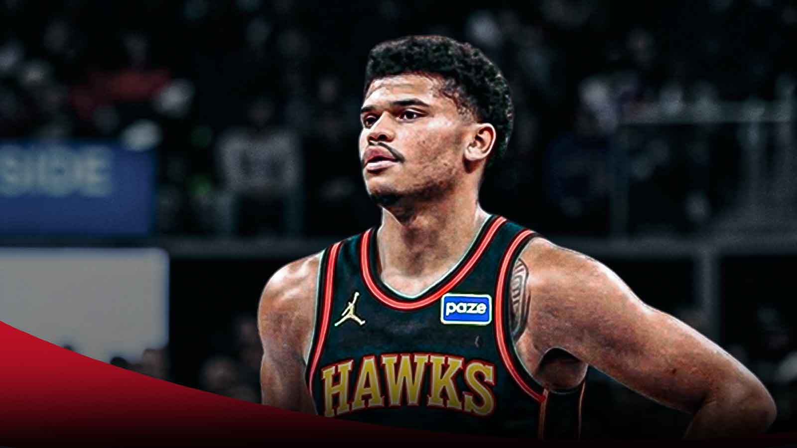 NBA player RayJ Dennis in an Atlanta Hawks jersey